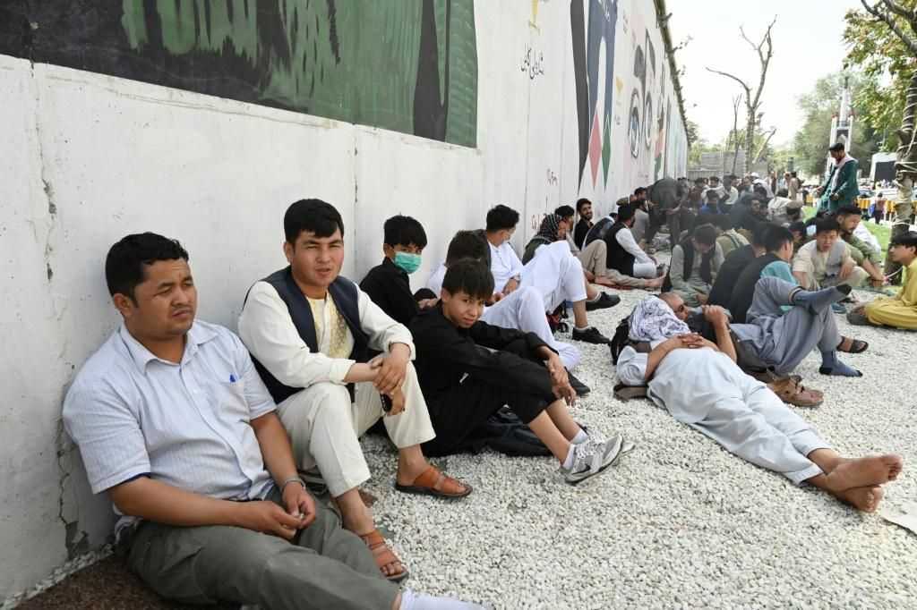 people sit near the french embassy in kabul Економічні новини