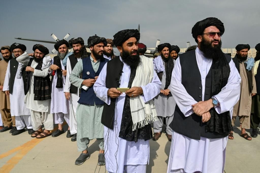 taliban spokesman zabihullah mujahid c with shawl led Економічні новини