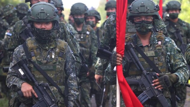 soldiers march to position during an anti invasion Економічні новини