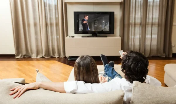 depositphotos 30021219 stock photo couple watching a movie Економічні новини - головні новини України та світу